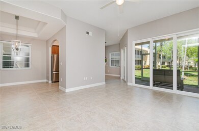 Unfurnished room featuring visible vents, baseboar