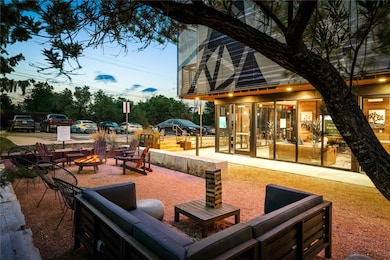 View of patio / terrace featuring an outdoor fire