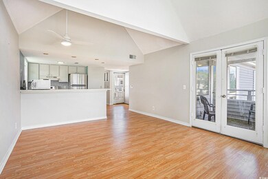 Unfurnished living room featuring a ceiling fan, l