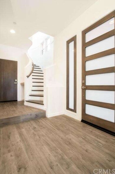 Entry Foyer from Front Entry and Garage Door Entry