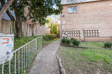 View of home's community with fence