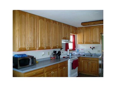 Kitchen. Nice cupboards and counters. Plentiful st