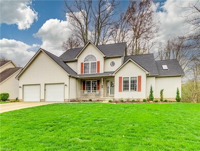 This fabulous home greets you with an inviting front porch.
