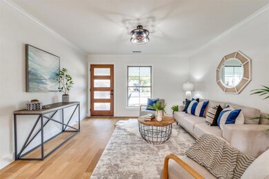 A light and bright living room provides plenty of 