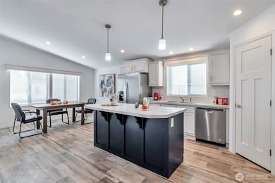 Dining area roomy enough for large table and hosting holiday gatherings, or small groups and extra help for the Chefs in the kitchen.