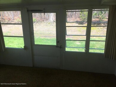 3 season room door to backyard