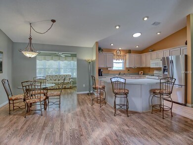 Lovely wood laminate floor creates a warm and invi