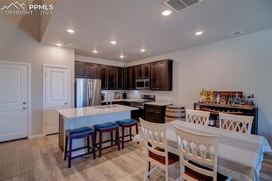 Kitchen with appliances with stainless steel finis