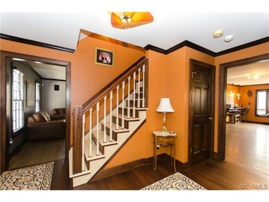Hallway with gorgeous wood flooring.