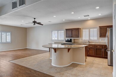 Great Kitchen features lots of cabinets, granite c
