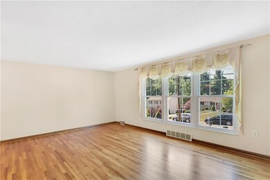 Living room is a great size for family & friends!
