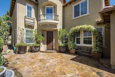 Welcome into your new home as you gain access through a tranquil setting with water fountain!