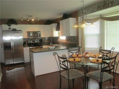 Completely Updated Kitchen & Dining Area with Stai