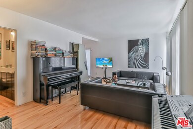 Living Room with powder room on the left