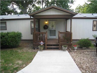 Front Covered Deck and Entrance to Home