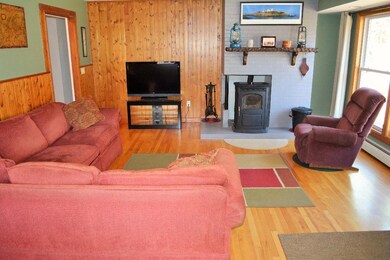 Living room featuring a Harmon...
