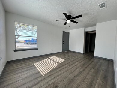 This unit is finished with brand new flooring, everything has a fresh coat of paint, and lighted fans are all new installs.