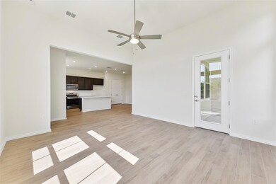 Unfurnished living room with light wood finished 