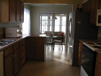 The large galley-style kitchen is fully-equipped, 