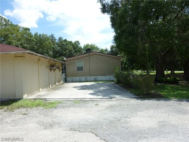 Large Parking Pad behind Shop for Boats, RV or Work Trailer