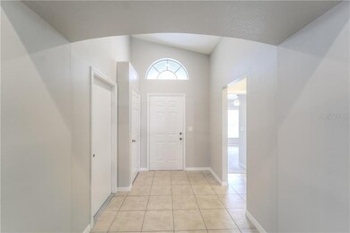 The expansive foyer welcomes you to this freshly p