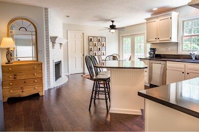 The gas fireplace will warm the kitchen all year l