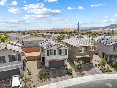 Aerial view of residential area featuring a mounta