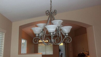 LIGHT FIXTURE IN DINING ROOM