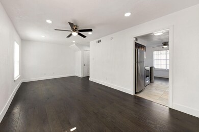 Unfurnished room with light wood-type flooring, ba