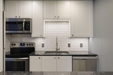 35 Nathan Ln N unit 203, Plymouth, MN 55441 - photo 2