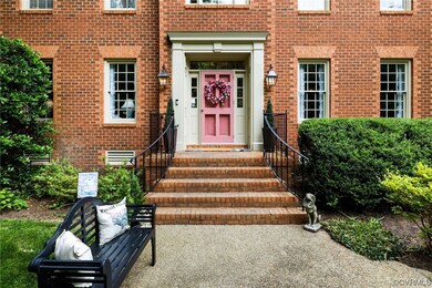 Brick front with aggregate walkway