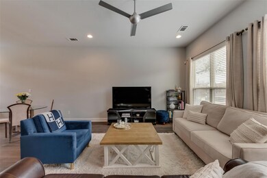 2nd floor living area features open layout and plenty of natural light.