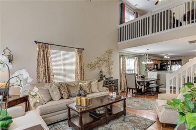 Hardwood floors throughout the main level living
