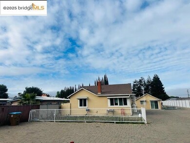 Rear view of house with a chimney