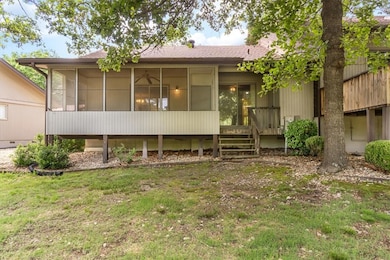 Back entrance through large screened in porch