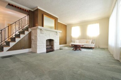 The entry way of the home opens to the large livin