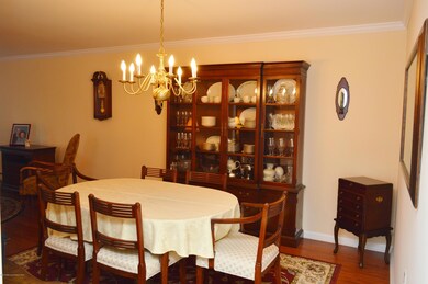 FORMAL DINING ROOM WITH WOOD FLOORS