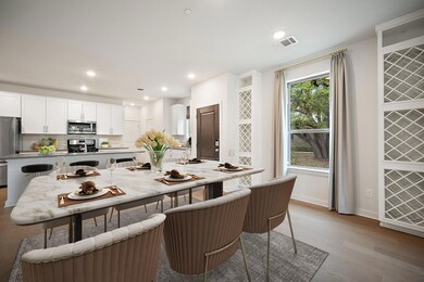 Dining space featuring baseboards, visible vents,