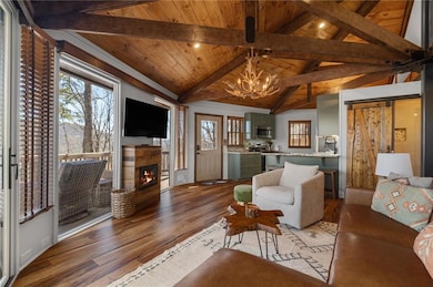 Great room area featuring a healthy amount of sunl