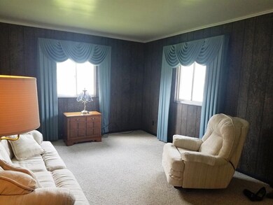 17 x 12 Living room   Wall to wall carpeting, pane