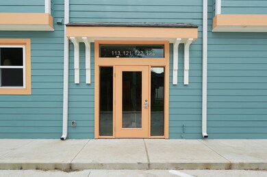 View of exterior entry featuring french doors