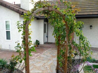 Step on up to the front door under the custom arbo