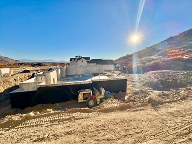 View of side of home featuring a mountain view