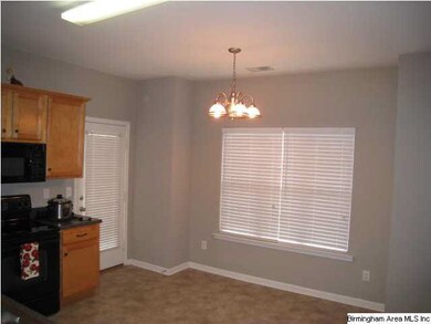 From Kitchen large window overlooking backyard and