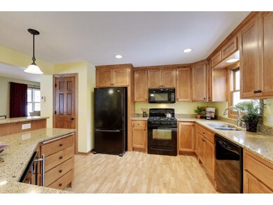 Updated kitchen has Cambria countertops, gas range