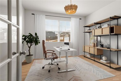 Versatile front room perfect for a home office or study | Virtually staged.