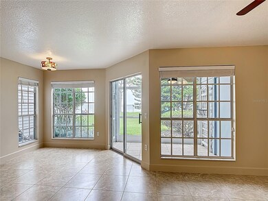 Screened in porch beside dining area