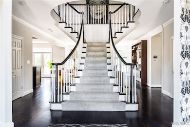 This Grand Foyer with curved walls and sweeping st