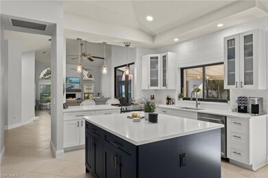 Kitchen with lofted ceiling, a healthy amount of s