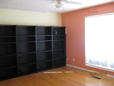 Bedroom 3 with hardwood floor